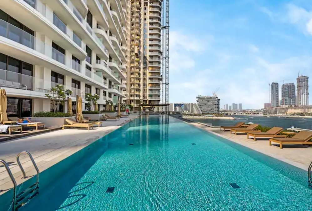 Residence pool terrace facing the water