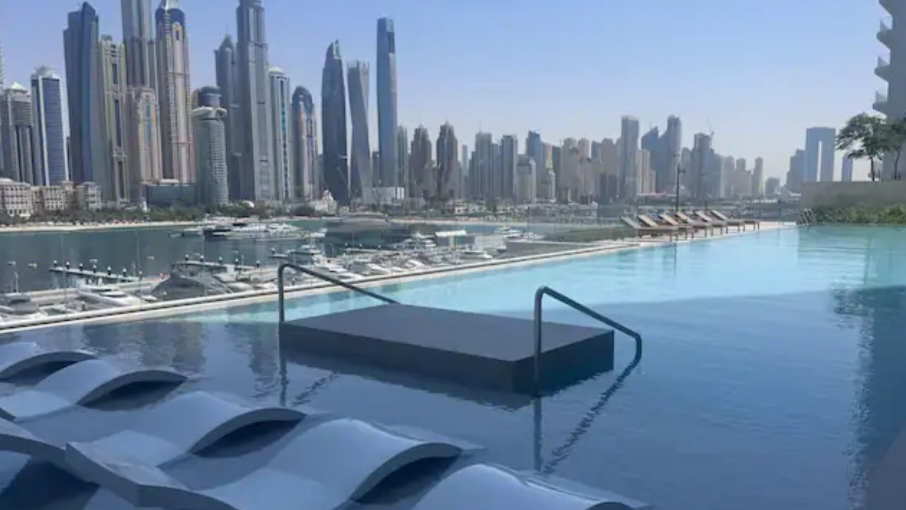 Infinity pool overlooking the marina and Dubai skyline